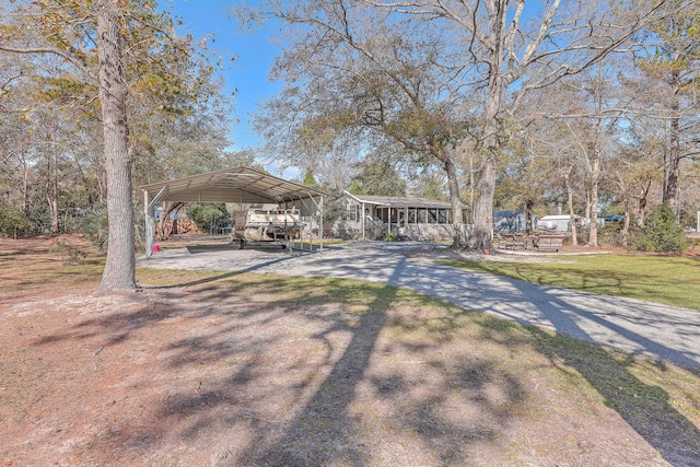 view of yard with a carport