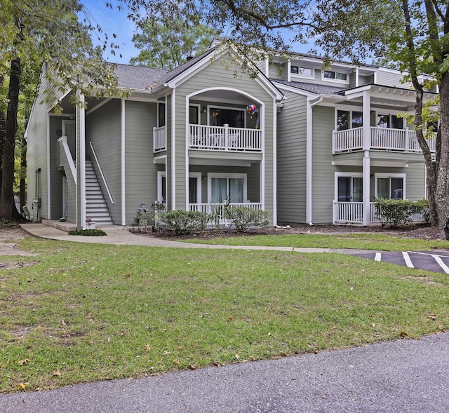 view of property featuring stairway