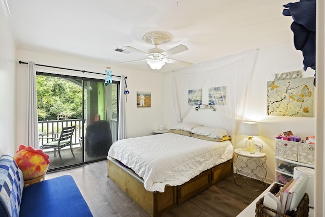 bedroom with ceiling fan, visible vents, wood finished floors, and access to outside