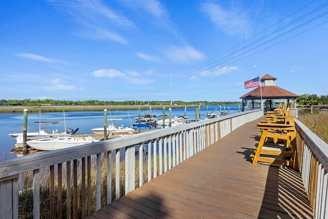 dock area with a water view and a gazebo