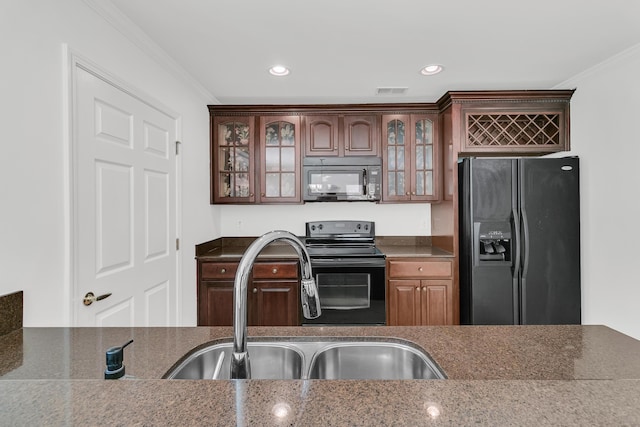 4823 Shady Tree Ln, Summerville, SC 29485 - kitchen featuring black appliances, a sink, crown molding, glass insert cabinets, and recessed lighting