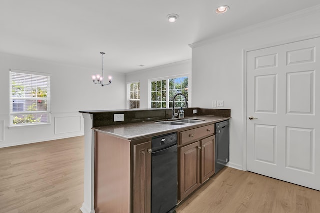 4823 Shady Tree Ln, Summerville, SC 29485 - kitchen featuring a sink, black dishwasher, light wood-type flooring, crown molding, and a chandelier