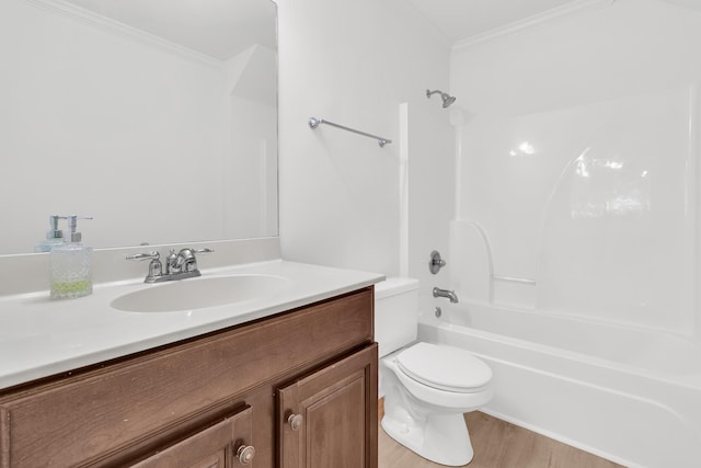 4823 Shady Tree Ln, Summerville, SC 29485 - full bathroom with crown molding, toilet, vanity,  shower combination, and wood finished floors