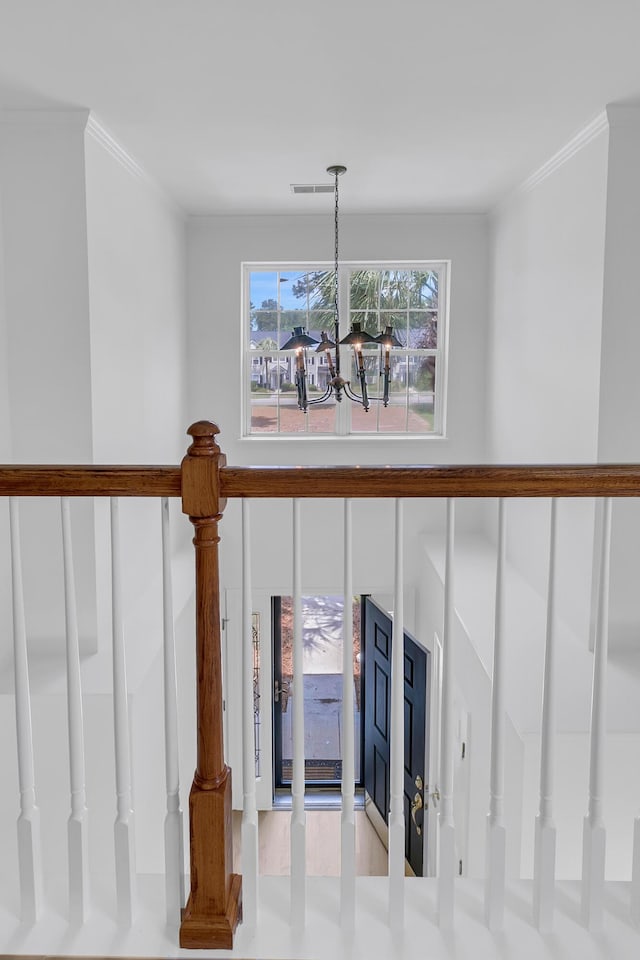4823 Shady Tree Ln, Summerville, SC 29485 - stairway featuring a chandelier and crown molding