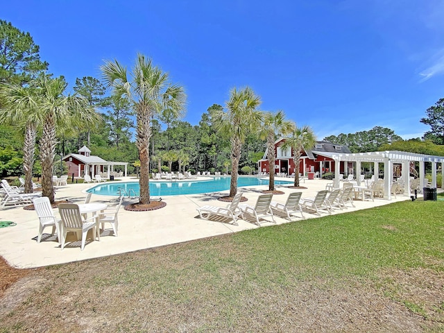 4823 Shady Tree Ln, Summerville, SC 29485 - community pool with a pergola, a yard, a patio area, and view of wooded area