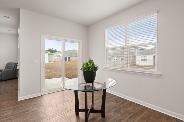 dining room featuring dark hardwood / wood-style floors