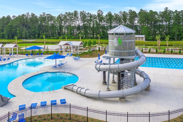 view of pool with a gazebo and a water slide