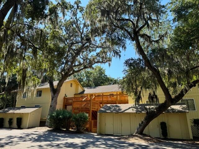 view of front of home with a wooden deck