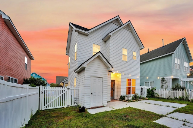 view of front of home featuring a gate
