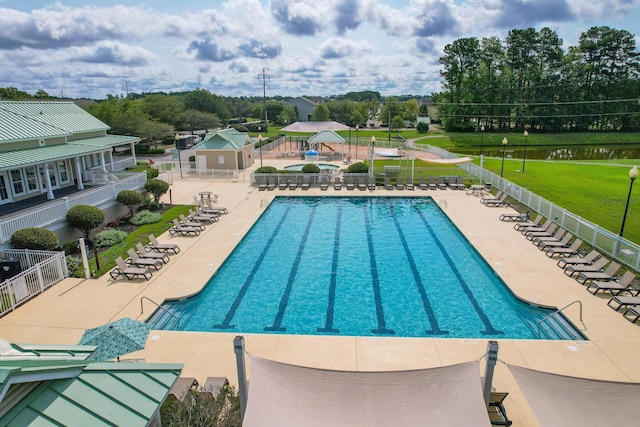 community pool with a patio area