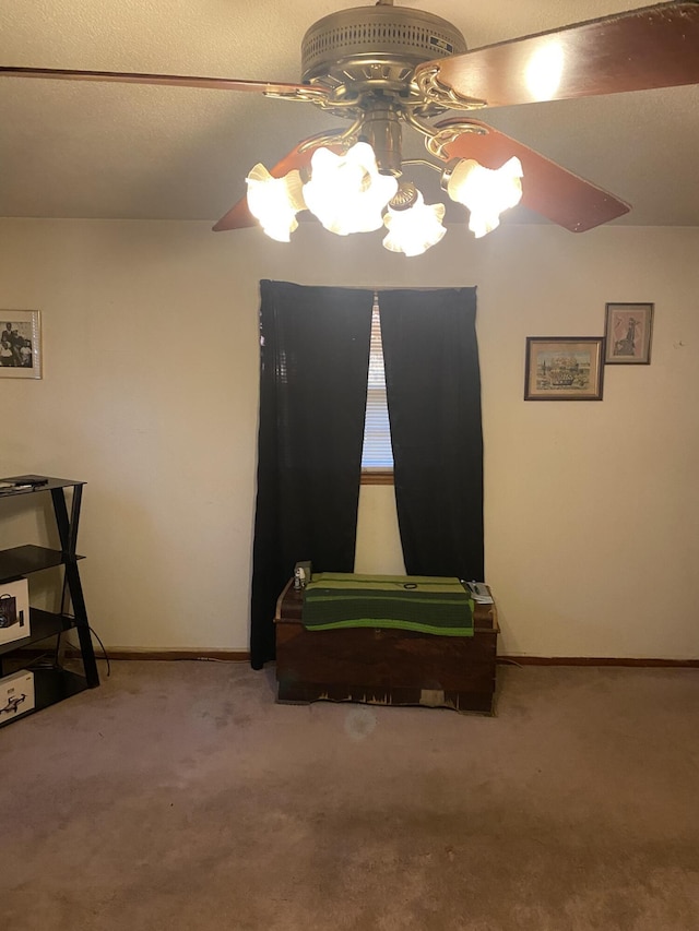 bedroom featuring ceiling fan and carpet floors