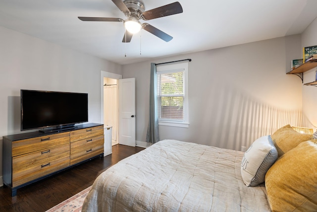 2924 Alabama Dr, North Charleston, SC 29405 - bedroom with dark wood-style floors, ceiling fan, and baseboards