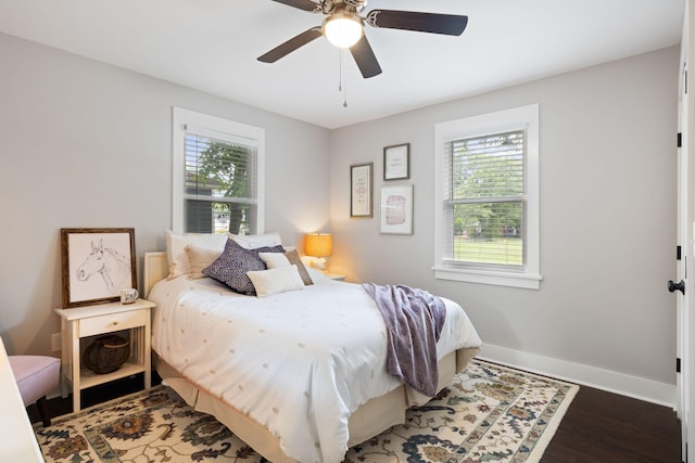 2924 Alabama Dr, North Charleston, SC 29405 - bedroom featuring multiple windows, baseboards, wood finished floors, and ceiling fan