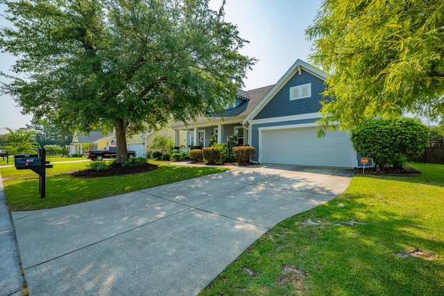 185 Red Leaf Blvd, Moncks Corner, SC 29461 - view of front facade featuring concrete driveway, a garage, and a front lawn