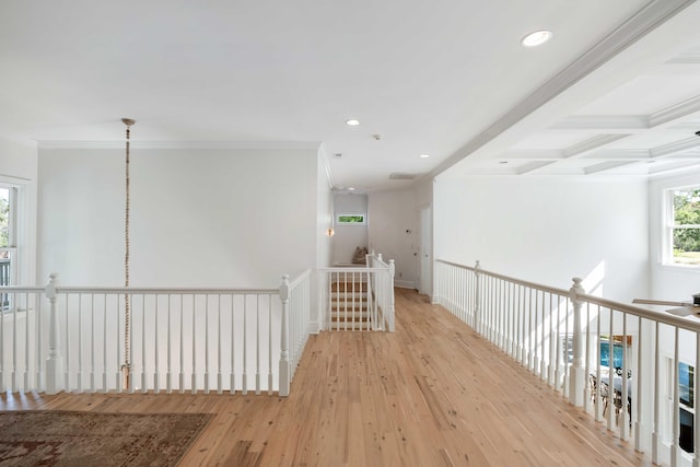 hall featuring ornamental molding, an upstairs landing, hardwood / wood-style floors, and recessed lighting
