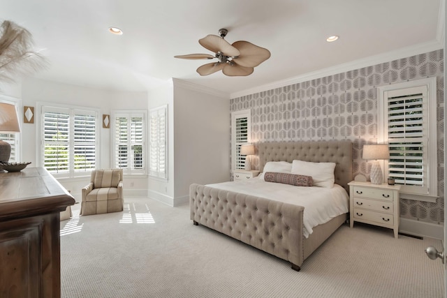 bedroom featuring ceiling fan, ornamental molding, carpet, and baseboards