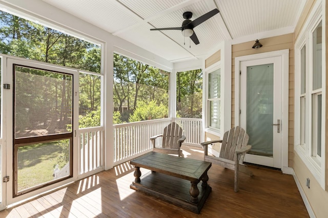 sunroom / solarium with ceiling fan