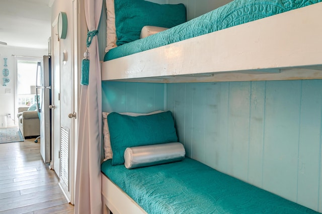 bedroom featuring wood finished floors