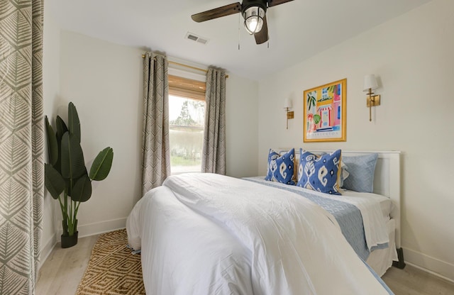 2317 Kent Ave, North Charleston, SC 29405 - bedroom featuring baseboards, a ceiling fan, and wood finished floors
