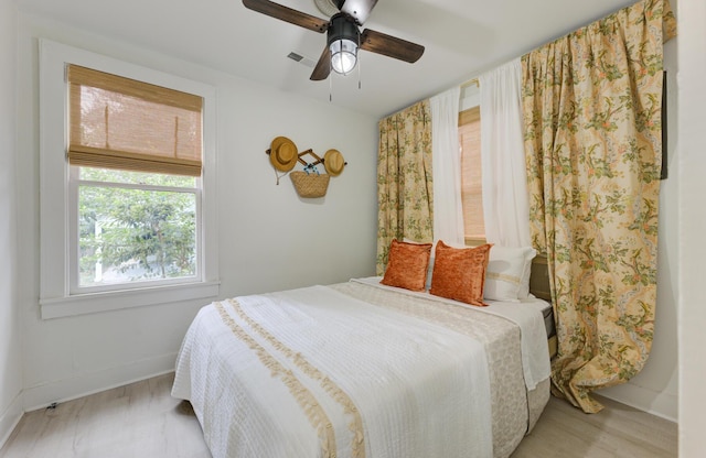 2317 Kent Ave, North Charleston, SC 29405 - bedroom featuring baseboards, ceiling fan, and light wood-style flooring