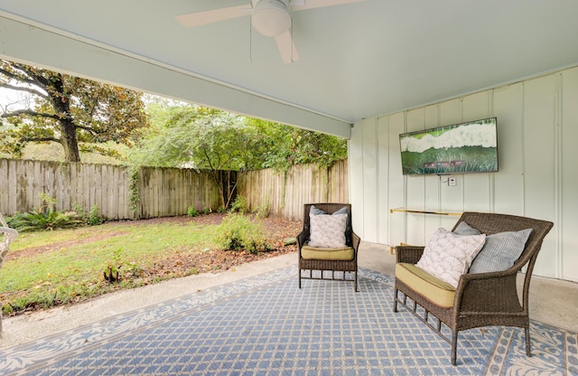 2317 Kent Ave, North Charleston, SC 29405 - fenced backyard with ceiling fan and a patio