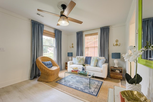 2317 Kent Ave, North Charleston, SC 29405 - living room featuring a ceiling fan, wood finished floors, and baseboards