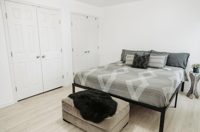 bedroom featuring light wood finished floors