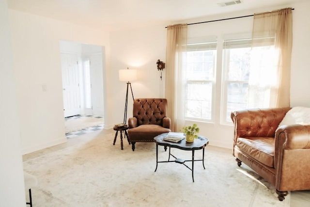 sitting room with visible vents