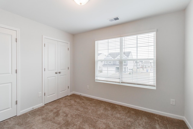 1816 Casein St, Summerville, SC 29483 - unfurnished bedroom featuring carpet floors, baseboards, a closet, and visible vents