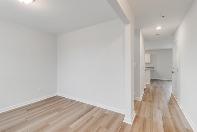 1816 Casein St, Summerville, SC 29483 - unfurnished room with light wood-type flooring, recessed lighting, baseboards, and arched walkways