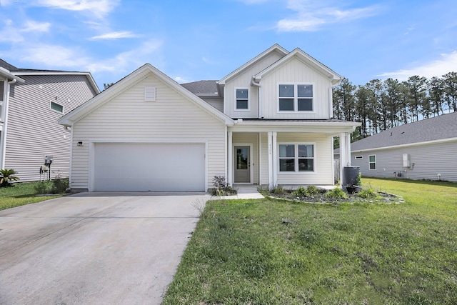 4308 Cotton Flt Rd, Summerville, SC 29485 - view of front of home featuring board and batten siding, a garage, concrete driveway, a front lawn, and a porch