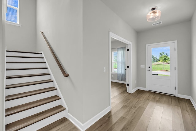 4308 Cotton Flt Rd, Summerville, SC 29485 - entrance foyer with baseboards, light wood-type flooring, and stairs
