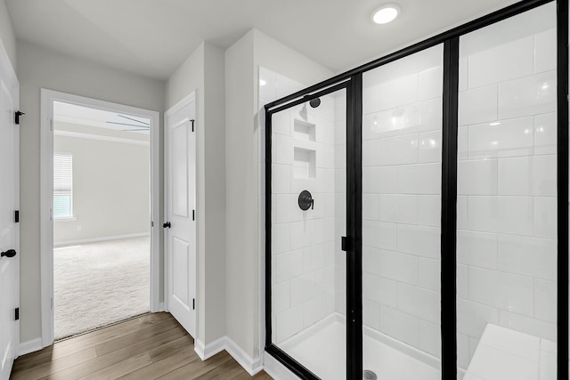 4308 Cotton Flt Rd, Summerville, SC 29485 - full bathroom featuring a stall shower, wood finished floors, and baseboards