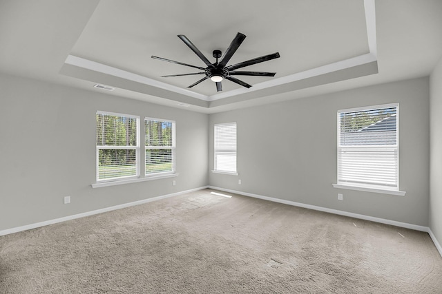 4308 Cotton Flt Rd, Summerville, SC 29485 - carpeted spare room featuring a raised ceiling, baseboards, and ceiling fan