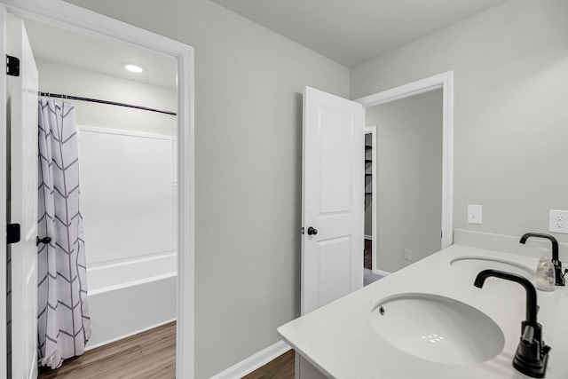 4308 Cotton Flt Rd, Summerville, SC 29485 - full bath with wood finished floors, shower / tub combo, double vanity, and baseboards