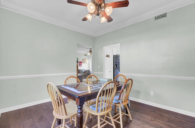 1600 Windsor Ln, Moncks Corner, SC 29461 - dining space featuring ceiling fan, wood finished floors, baseboards, and crown molding