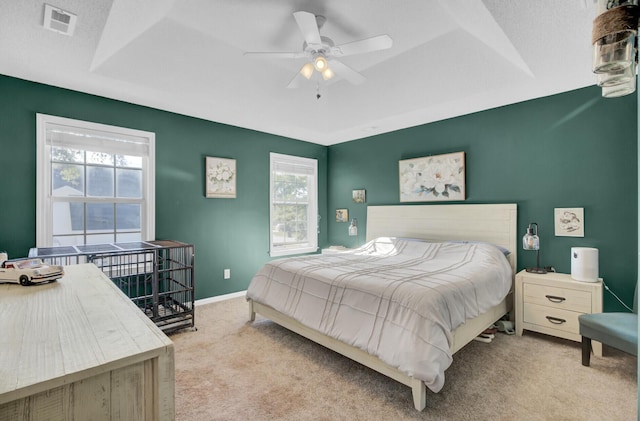 1600 Windsor Ln, Moncks Corner, SC 29461 - carpeted bedroom with a tray ceiling, ceiling fan, and baseboards