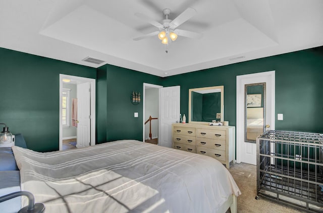 1600 Windsor Ln, Moncks Corner, SC 29461 - bedroom with a tray ceiling, carpet floors, and ceiling fan