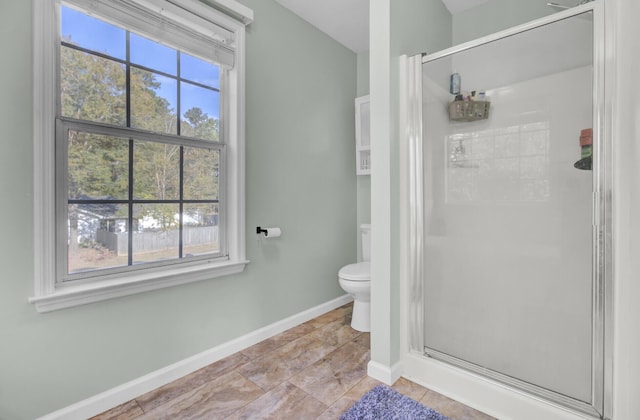 1600 Windsor Ln, Moncks Corner, SC 29461 - bathroom with a shower stall, toilet, and baseboards