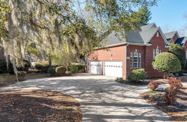 view of property exterior featuring a garage