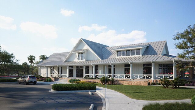 view of front facade with a front lawn and a porch