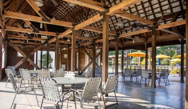 interior space with a gazebo and ceiling fan