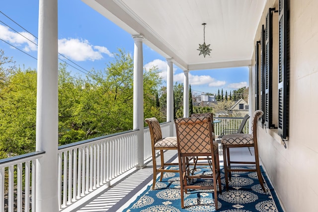 sunroom / solarium featuring a healthy amount of sunlight