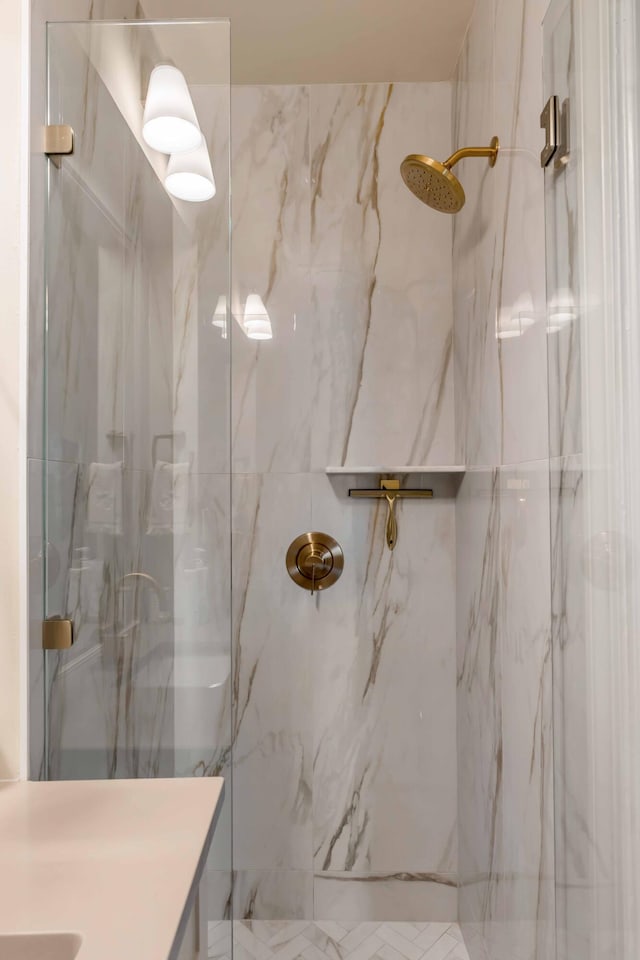 bathroom with tiled shower