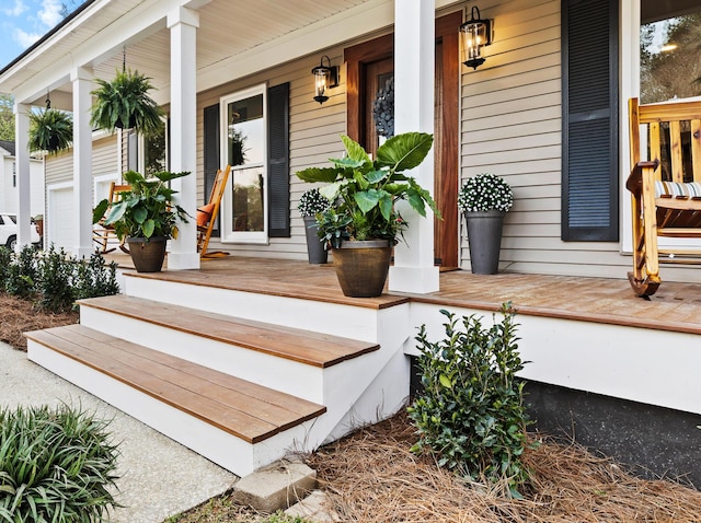 property entrance featuring covered porch