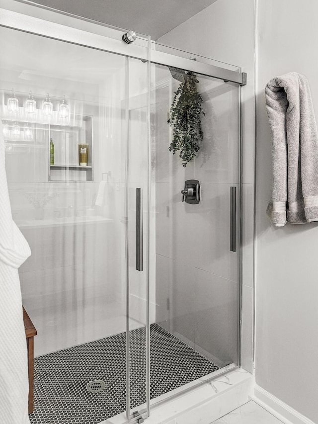 bathroom with a stall shower