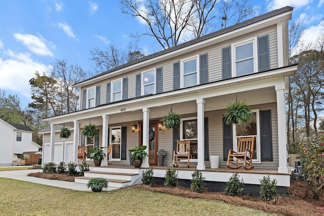 view of front of home featuring a porch and a front lawn