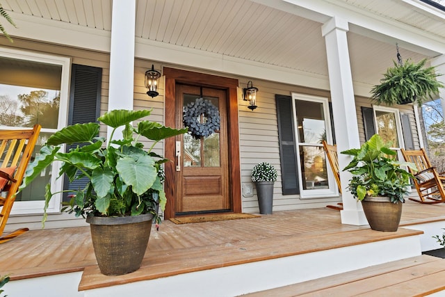 entrance to property with a porch