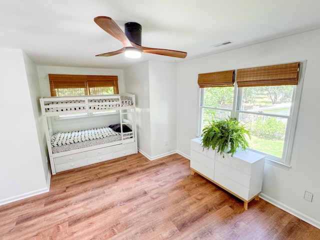 27 Fitzroy Dr, Charleston, SC 29414 - bedroom with multiple windows, wood finished floors, and baseboards
