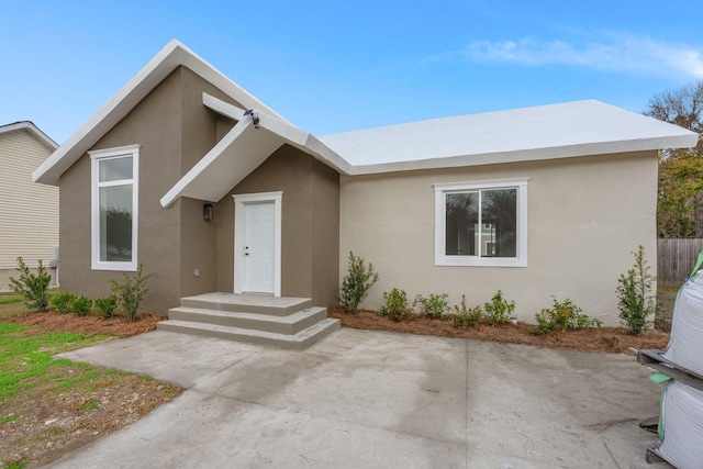 view of front of property featuring a patio